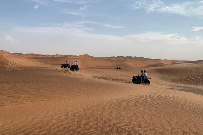 Dubai: Unique SUNSET Quad Bike Red Dunes Safari - How the Lahbab Sunset Safari Flows (Pickup to Camp)