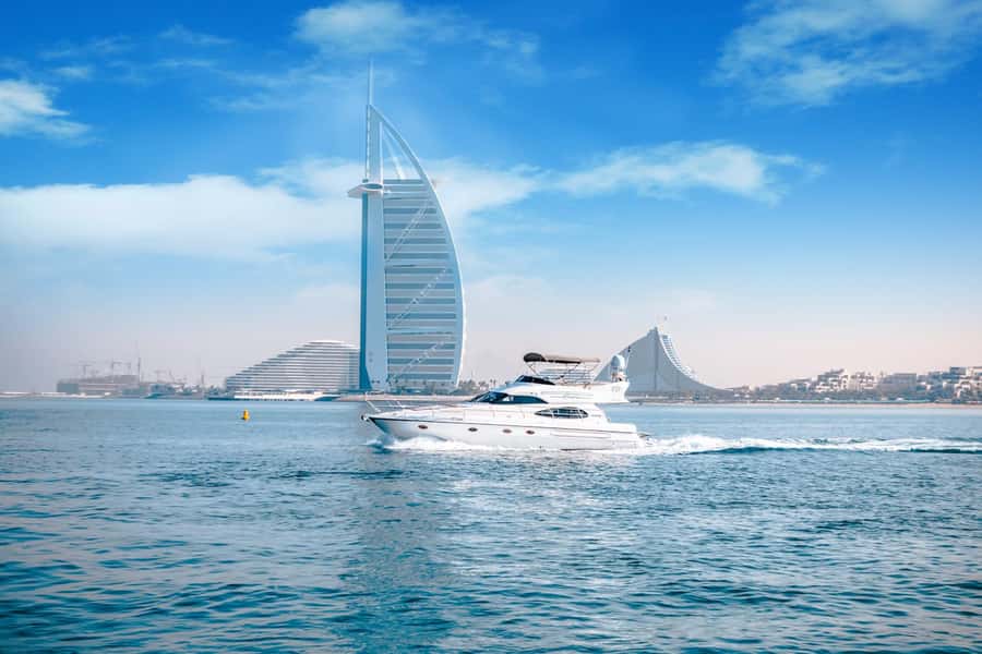 Dubai Yacht Tour - Boat Trip upto 12 guests Private event - Onboard comfort: Wi-Fi, towels, music speaker, and the grill setup