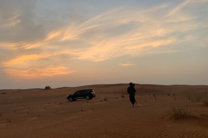 DUNE BASHING - Desert Safari, The Heartbeat of Dubai! - Bedouin Camp Highlights: Camel Ride, Henna, Arabic Dress Photos