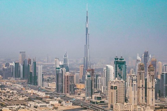 DXB Private Half-Day Dubai City Tour: Iconic Sights & Landmarks - Burj Al Arab and Palm Jumeirah Atlantis, iconic, but mostly from the road