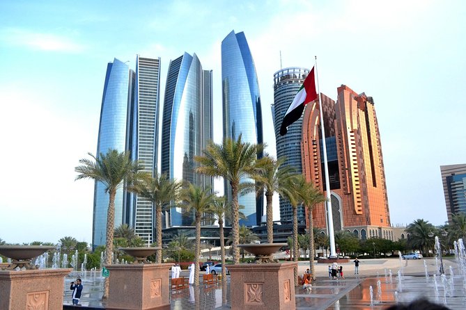 Enjoy Abu Dhabi City Tour and Desert Safari - Al Khatim desert safari: dune bashing, camel riding, and sand boarding