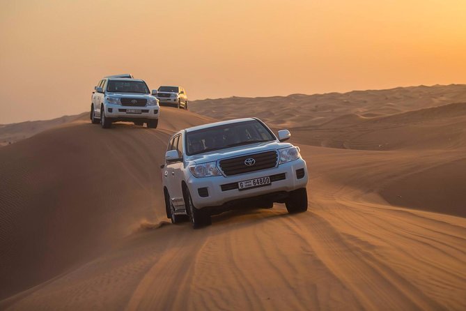 Evening Desert Adventure: Quad Biking, Sandboarding & Camel Ride - Arriving at the camp in Al Awir: coffee, dates, henna, and dress-up
