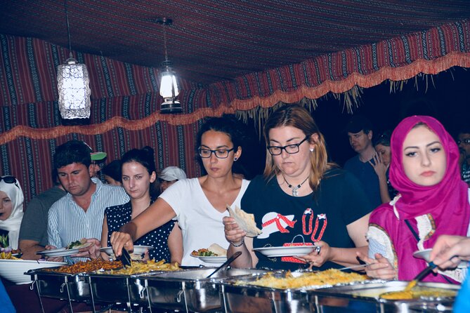 Evening Desert Safari Abu Dhabi with Hot BBQ Dinner - Camp dinner, coffee, and the classic live shows