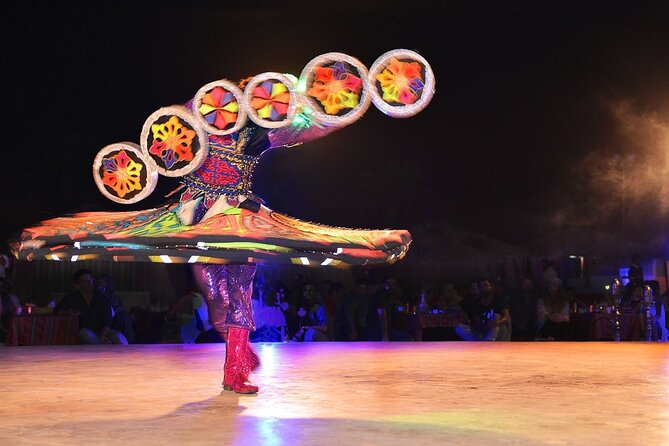 Evening Desert Safari Dubai with Camel Riding & BBQ Buffet Dinner - Live entertainment: belly dance, fire shows, and Tanura