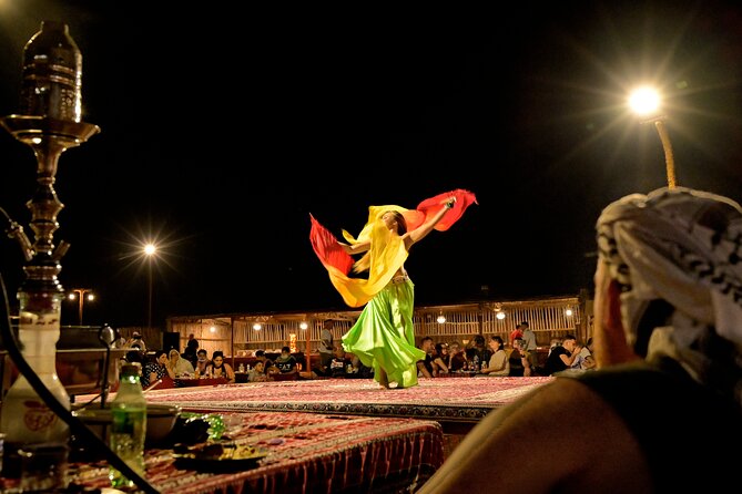Evening Desert Safari in Dubai, Sandboard & BBQ Dinner - Camel ride and henna: short, traditional, and photo-friendly