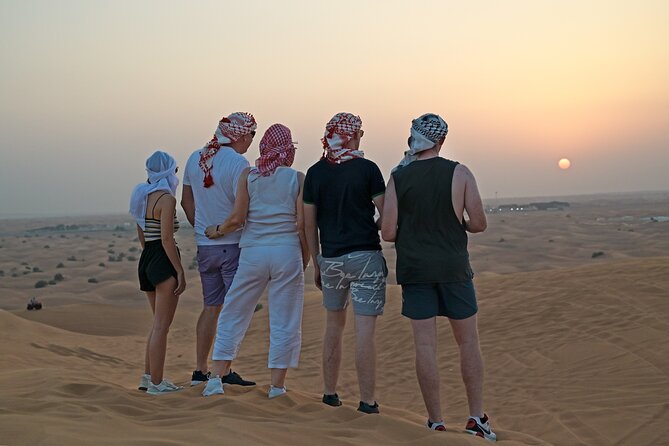 Evening Desert Safari in Dubai, Sandboard & BBQ Dinner - Falconry, fire show, Tanoura, and belly dance timing