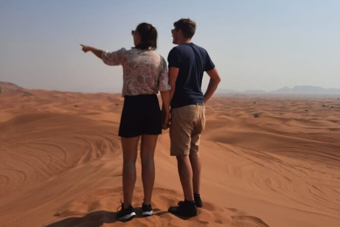 Evening Desert Safari in Dubai with Dune Bashing , Camel Ride and BBQ Dinner - Dune Bashing and Sandboarding: Built for Fun, Not Just Speed