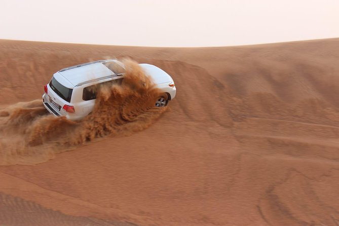 Evening Desert Safari with BBQ Dinner - Sandboarding, plus the quad bike option if you want more speed