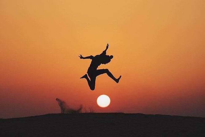 Evening Dubai Safari with BBQ, Dance Shows & Quad Biking optional - Dinner Under The Stars: BBQ Buffet, Unlimited Drinks, and Dance Shows