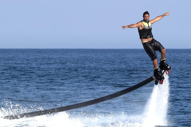 Flyboard in Dubai - How Beginner Lessons Work: Helmet, Life Jacket, and Instructor Power Control