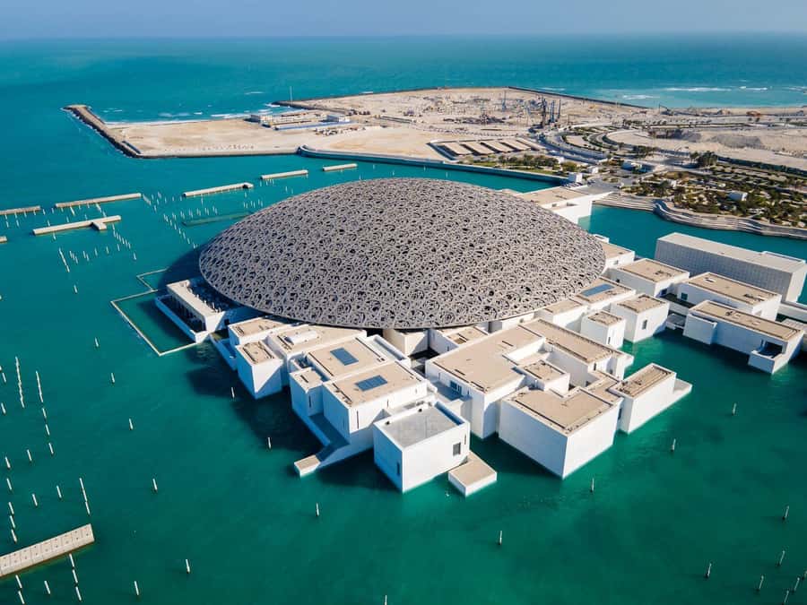 From Abu Dhabi: City Tour with Grand Mosque & Louvre Museum - Sheikh Zayed Grand Mosque: White Tile Magic and the Dress-Code Reality