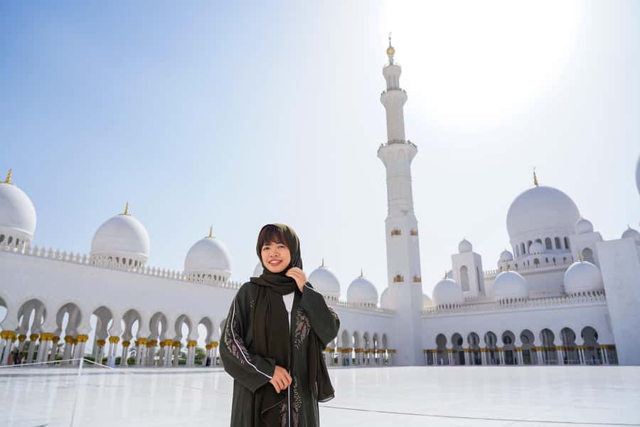 From Abu Dhabi: Grand Mosque, Royal Palace& Heritage Village - Pickup timing, comfort, and the strict dress code that controls everything