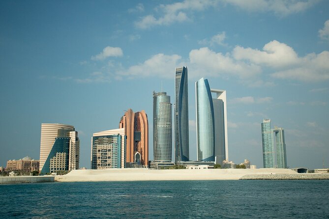 From Dubai: Abu Dhabi Full-Day Trip with Louvre & Mosque - Emirates Palace and the Presidential Palace Drive-Through: Big Moments, Minimal Footwork