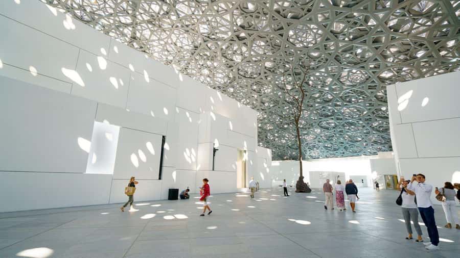 From Dubai: Abu Dhabi Grand Mosque Visit & Theme Park Option - Sheikh Zayed Grand Mosque: spectacular, but dress code is the main event