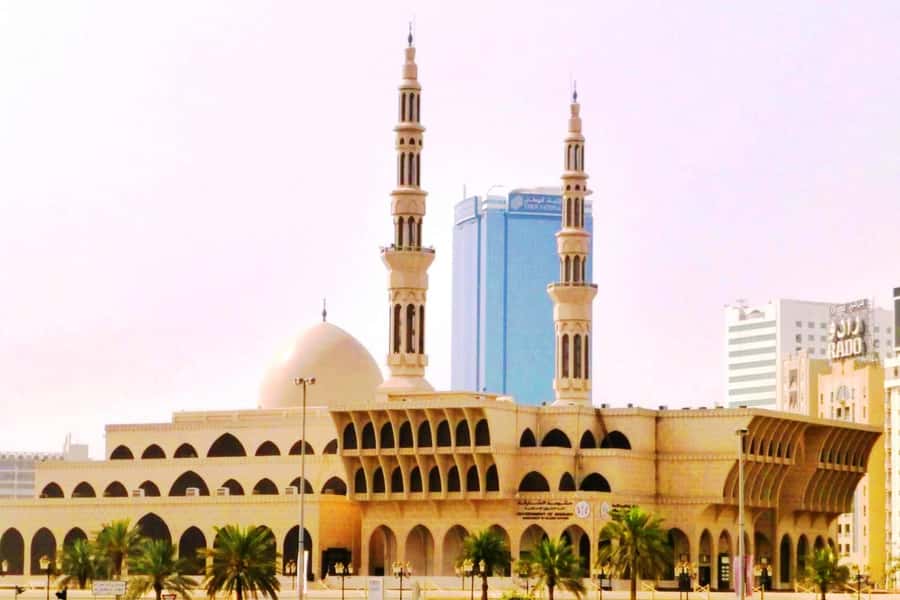 From Dubai: Sharjah Heritage & Culture Tour - King Faisal Mosque: your best photo moment, and your dress rehearsal