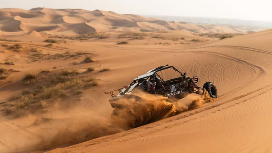 From Dubai: Zerzura Buggy Experience + Private Dinner - The dune buggy part: self-driving, safety gear, and dune time