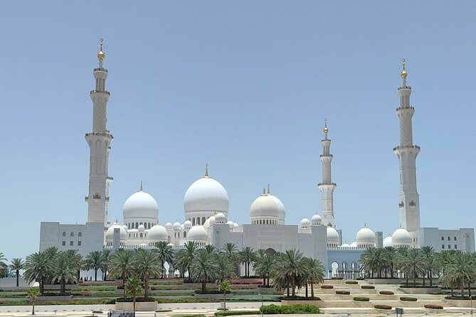 Full Day Abu Dhabi City Tour with Ferrari World - Emirates Palace Marina and Emirates Heritage Village: luxury and craft in quick hits