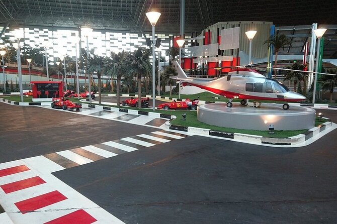 Full-Day Tour With Ferrari World Ticket in Abu Dhabi - Emirates Heritage Village and Corniche Beach Views: Oil History Without the Classroom Feel