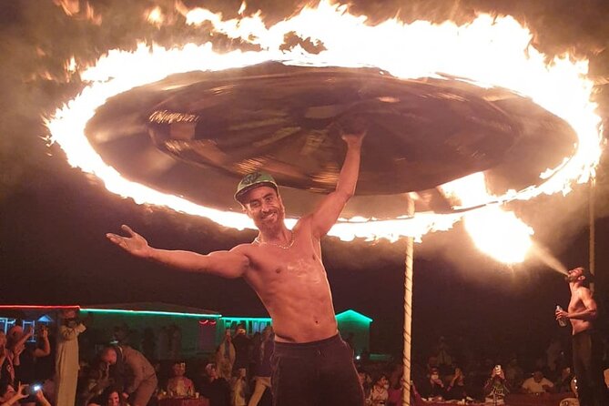 Guided Desert Safari with Dinner and Quad Biking in Dubai - Bedouin camp arrival: coffee, dates, henna, and the show package