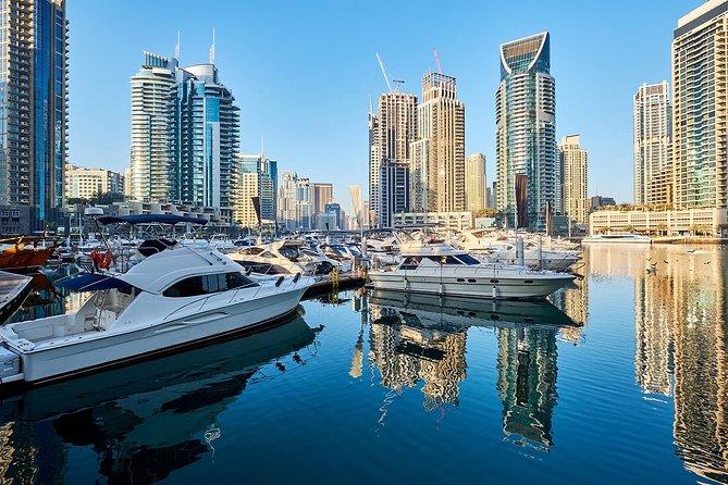 Half-Day Dubai City Tour with Blue Mosque, Creek, Souks & Abra - Modern-photo stops: Burj Khalifa and Museum of the Future ground floor