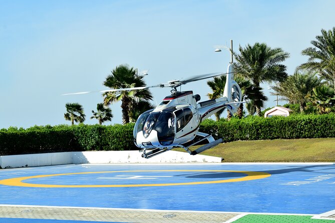 Helicopter Private Tour in Abu Dhabi - Presidential Palace and the Heritage Village contrast