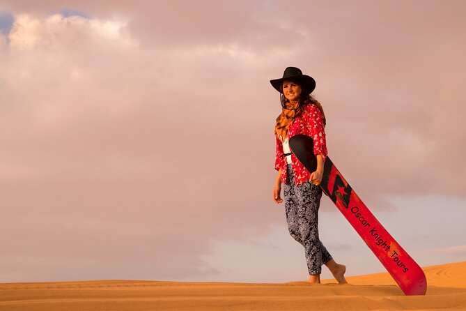 High Red Dunes with Camel Ride, Sandboarding, Falcon Show and VIP BBQ Dinner - Optional quad bikes: fun if you plan for the sales pressure
