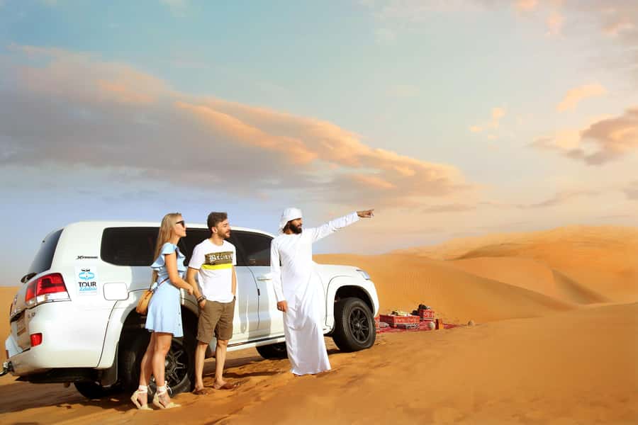 Luxury Dubai Desert Safari, BBQ, Camel Ride, Quad Bike, Show - When the desert night starts: pickup, drop-off, and real timing