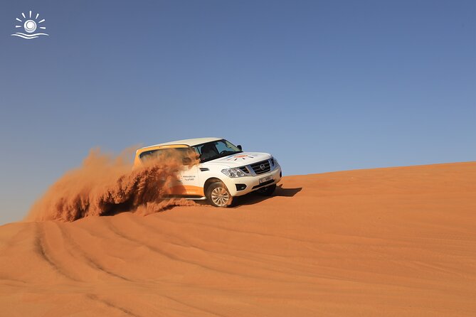 Morning Desert Safari in Dubai with Camel Ride - Sandboarding on red dunes, the quick skill that feels like free falling