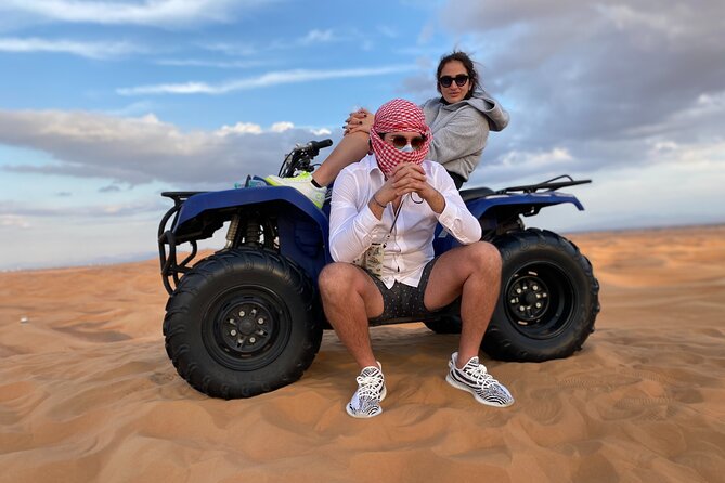Morning Desert Safari, Quad Bike, Sandboard and Camel Ride - Dune bashing with an expert driver, plus desert photo moments
