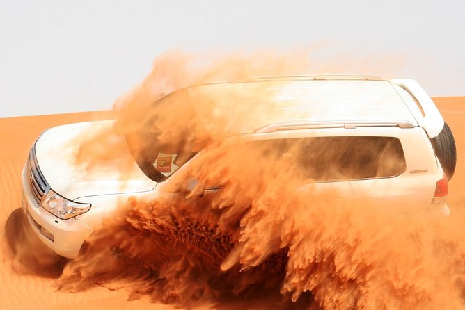 Morning Dubai Desert Safari with Sand boarding and Camel Ride - Dune bashing over the red dunes: the main event