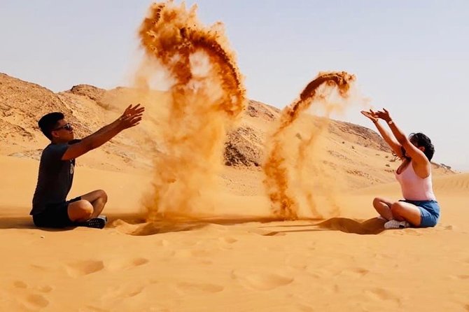 Morning Red Dunes with Camel Ride, Sandboarding and Refreshments - Sandboarding: the fun part right after dune time