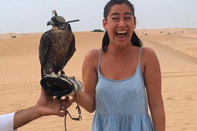 Morning Red Dunes with Camel Ride, Sandboarding and Refreshments - Falcons in winter, camels any time: photo moments built in