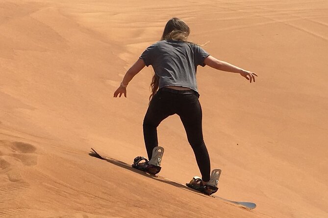 Morning Red Dunes with Camel Ride, Sandboarding and Refreshments - Desert camp treats: Lukaymat, dates, and Arabic coffee