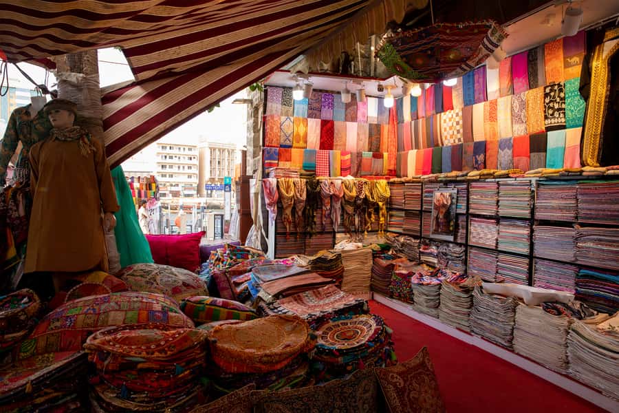 Old Dubai Historic Guided Tour: Creek, Street Food & Souks - Bur Dubai Souk Stops and the Abra Dock Break
