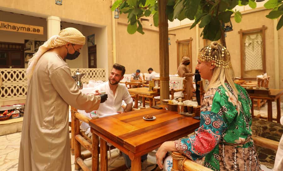 Old Dubai Historic Guided Tour: Creek, Street Food & Souks - Dubai Creek by Abra: Trading Ships and Skyline Views