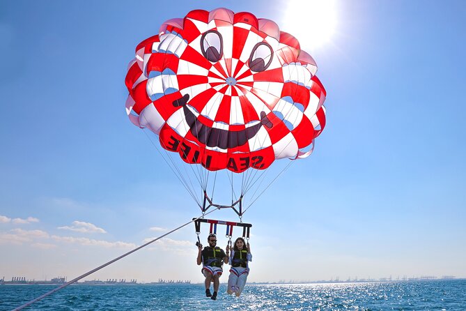 Parasailing in Dubai with Palm Jumeirah and JBR Beach views - The quick ride to JBR: where time can feel long in the sun