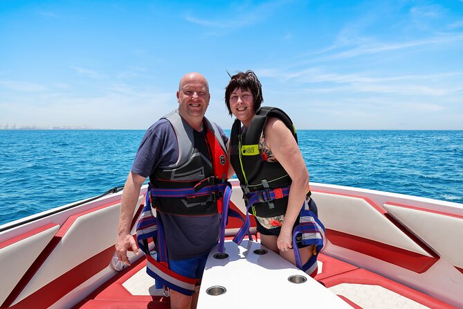 Parasailing in Dubai with Palm Jumeirah and JBR Beach views - Rigging up and safety: the calm part of the thrill