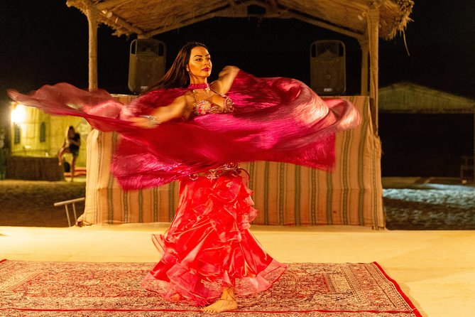 Premium Dubai Desert Safari with BBQ Dinner in the Red Dunes - Camp Arrival: Henna, Tanoura, Shisha, and Star Time