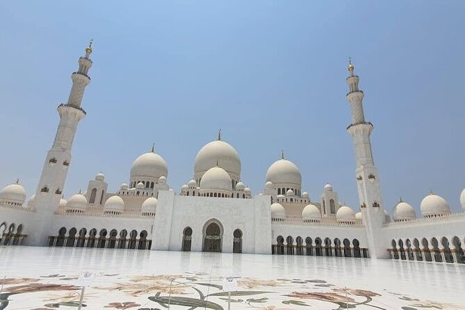 Premium Half Day Abu Dhabi Grand Mosque Tour from Dubai - Entering Sheikh Zayed Grand Mosque Center: What to Expect on Arrival