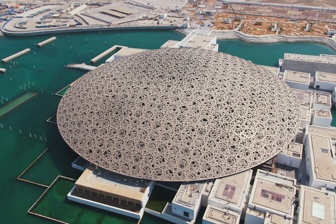 Private Abu Dhabi City Tour with Emirates Palace, Grand Mosque - Corniche Road photos plus a desert-living snapshot at Emirates Heritage Village