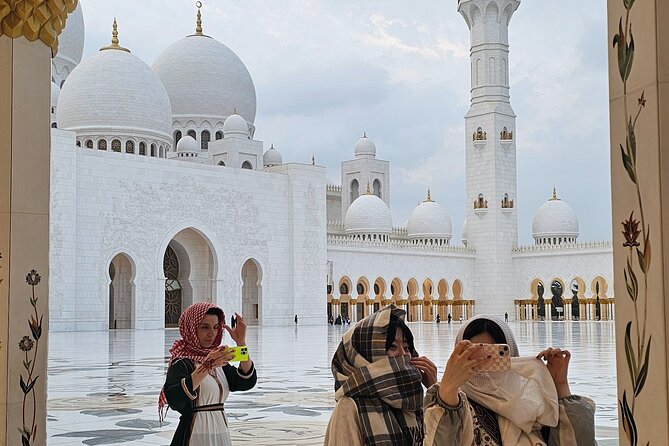 Private Abu Dhabi City Tour With Pickup From Abu Dhabi or Dubai - Heritage Village and the Dates Market: A Softer Side of Abu Dhabi