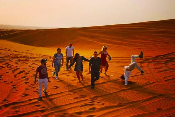 Private Desert Safari Red Dune with BBQ, Sand Boarding and Camel Ride - Camel Farm to Camel Ride: Slower Pace, Real Desert Animal Time
