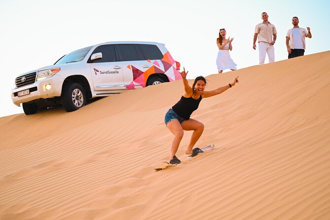 Private Sunrise & Dune Bashing in Abu Dhabi - The remote desert camp stop: camel ride and sandboarding