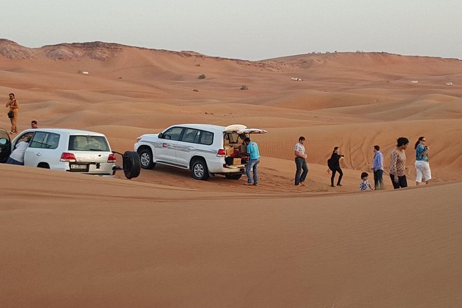 Ras Al Khaimah Desert Safari with Dune Bashing, Belly Dance and BBQ Dinner - BBQ dinner with buffet stations, unlimited drinks, and a shisha corner