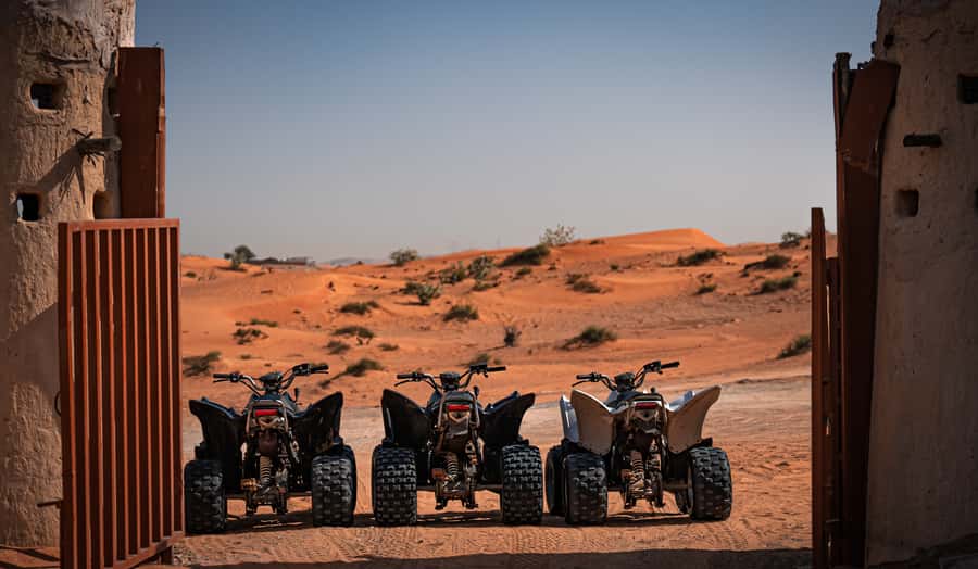 Ras Al Khaimah: Guided Quad Bike Tour - Dune bashing and BBQ with traditional dance: the full desert package