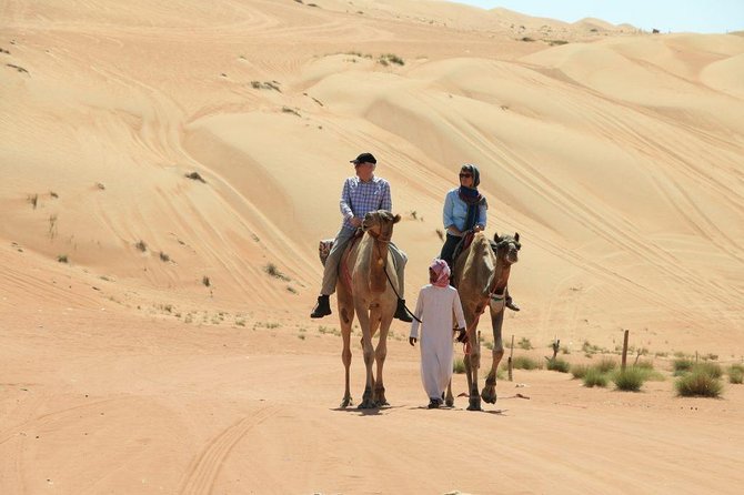 Red Dune Desert Safari with BBQ Dinner, Sand Boarding Dance Shows - Land Cruiser Ride, Dune Bashing, and How to Prepare