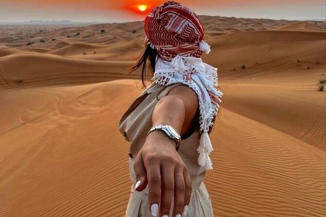 Red Dunes Desert Safari 4x4 Pickup & Drop, Camel Ride BBQ & Shows - The Ride Everyone Talks About: Dune Bashing and Sunset Timing