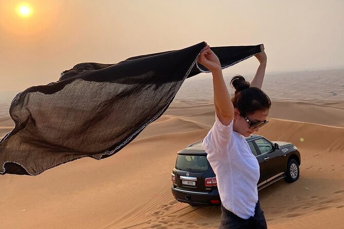 Red Dunes Desert Safari Dubai with Dinner Buffet, Show & Transfer - What to wear and bring for comfort on the sand