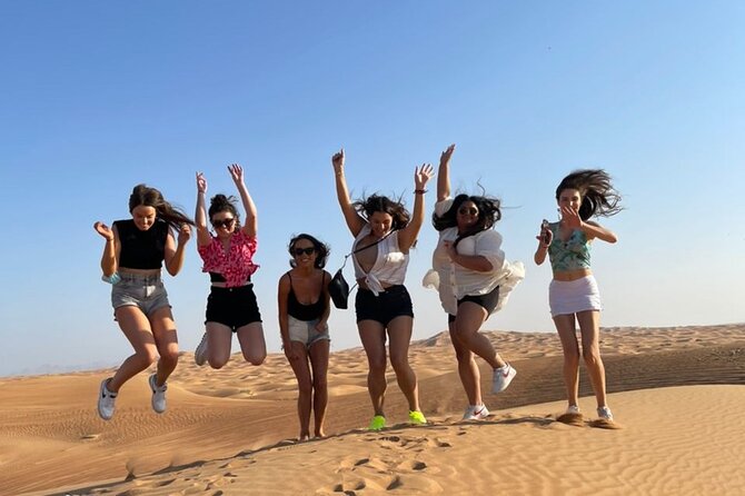 Red Dunes Desert Safari Dubai with Dinner Buffet, Show & Transfer - Stop in Lahbab: water, restrooms, optional quad bikes, and photo moments