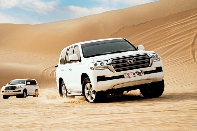Romantic Private Dune Dinner Abu Dhabi - 4x4 dune bashing in the Al Khatim dunes